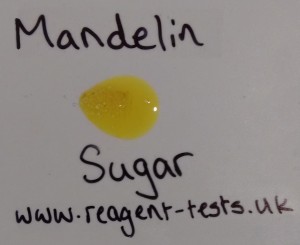 Sugar reaction with the mandelin reagent